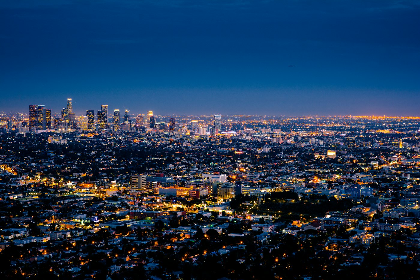A city skyline and cluster of buildings, evoking the financial environment in which the firm operates (illustrative image)